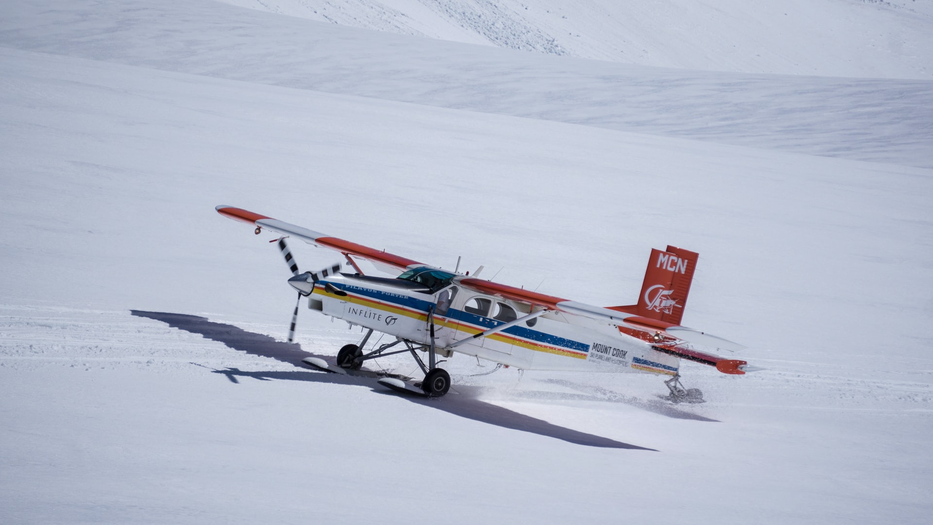 A small airplane landed in snow after completing a flight to Antarctica.